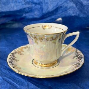 Vintage tea cup and saucer set, identified as RGK Czechoslovakia.